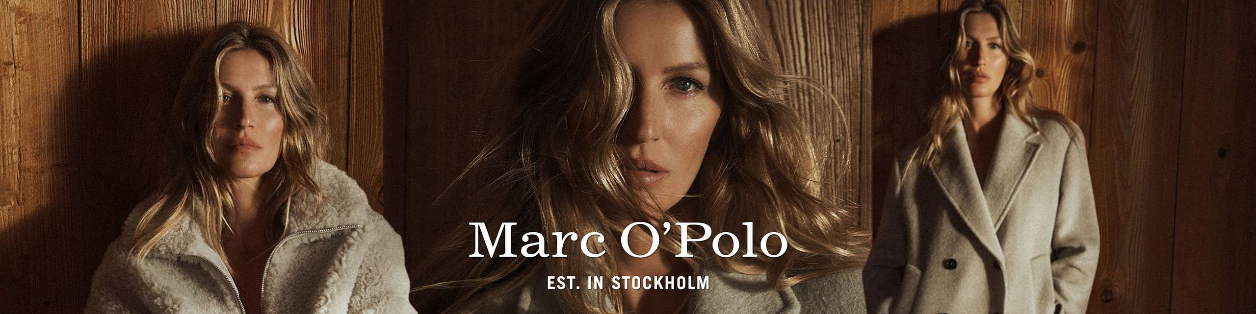 Modelka siedząca w jasnym, futrzanym stroju na tle drewnianej ściany; reklama marki Marc O’Polo.