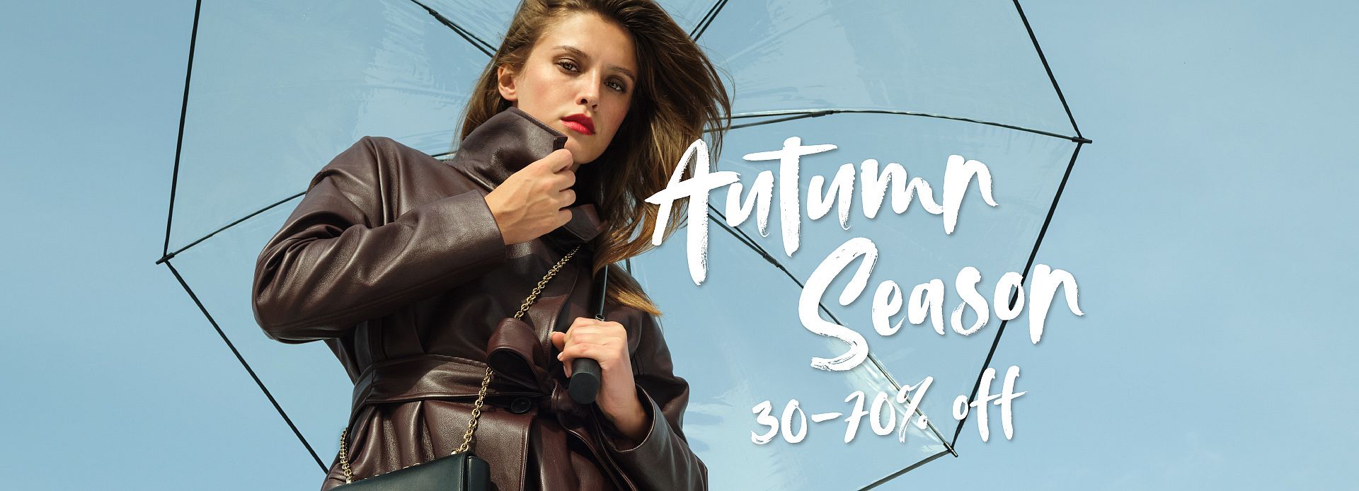 Woman in leather coat with umbrella, text: “Autumn collections 30–70% off”.